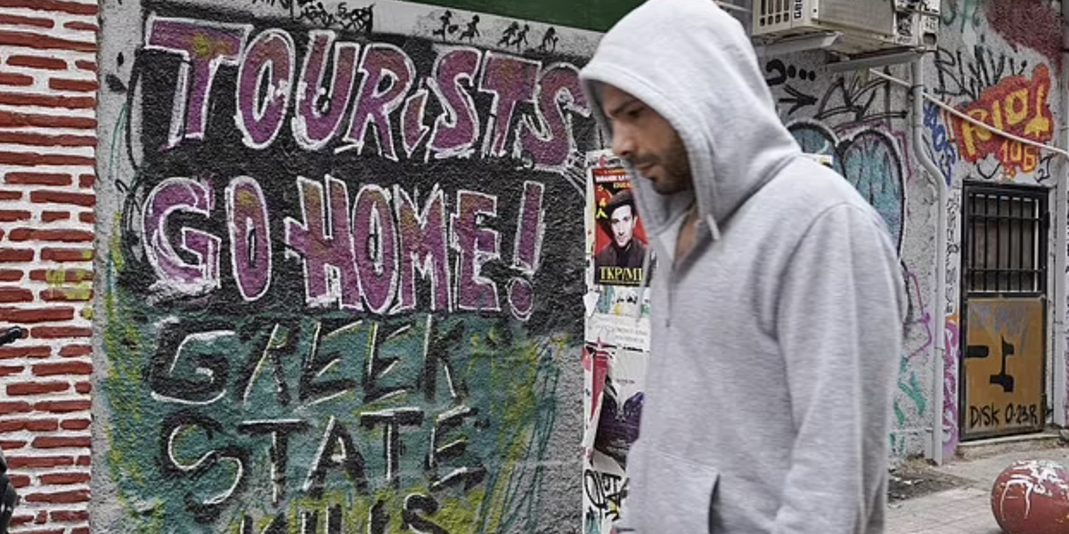 NextImg:Greece the latest country to be hit by anti-tourism activists: 'No tourists, no hipsters!'