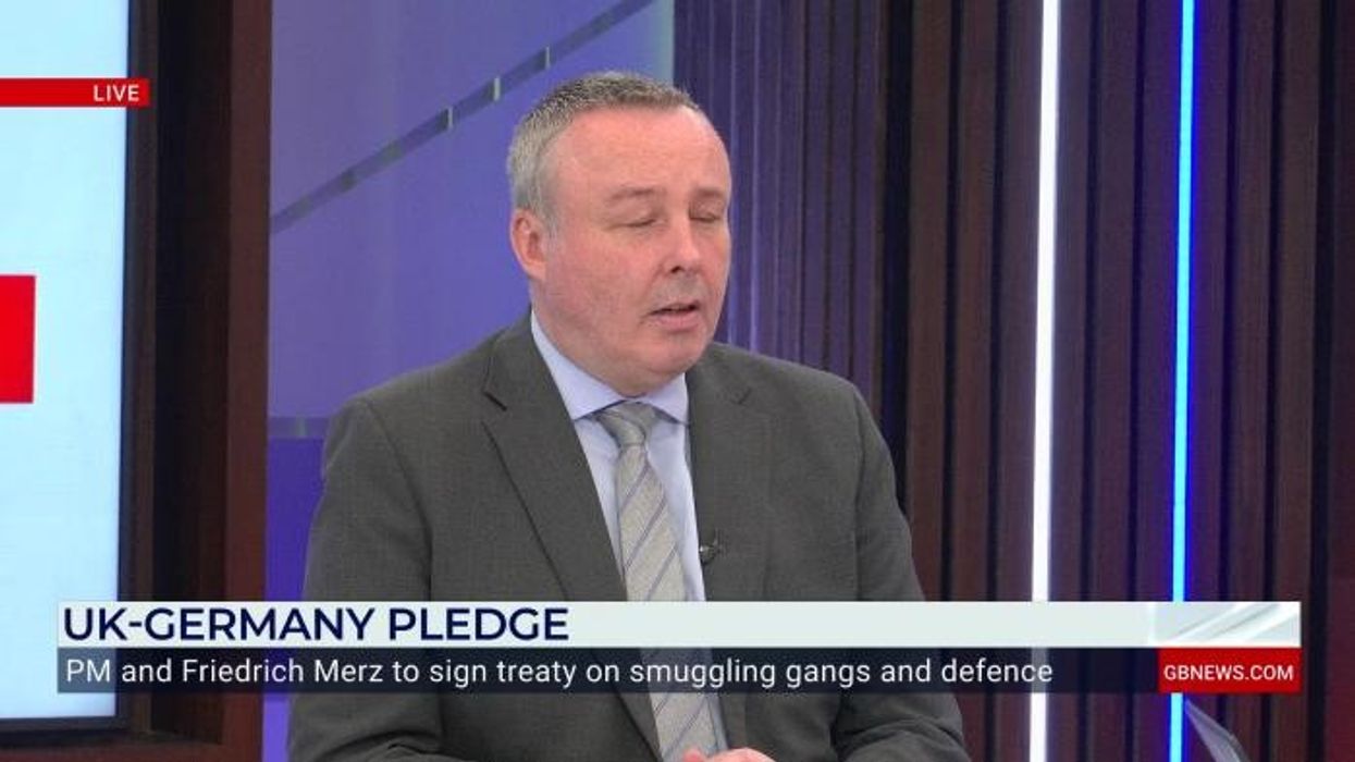 WATCH: Channel migrants seen being handed bottles of water by French as coastguard continues to supply lifejackets