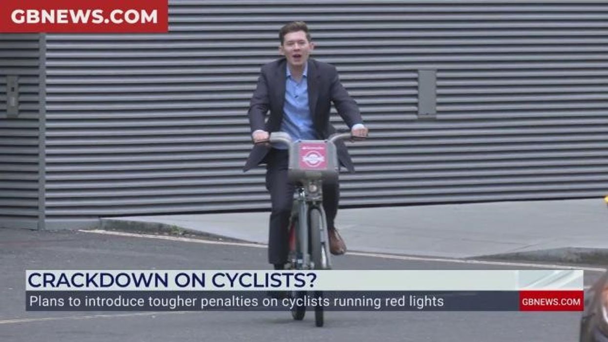 'None of your business!' Moment GB News reporter confronts London cyclists for running red lights