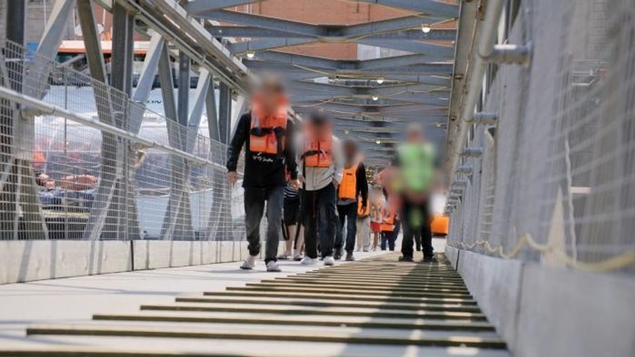 Watch moment small boat migrants are detained in Dover before being sent back to France