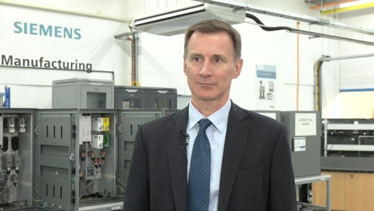 Jeremy Hunt's constituency office vandalised as 'die Tory scum' splatted across windows