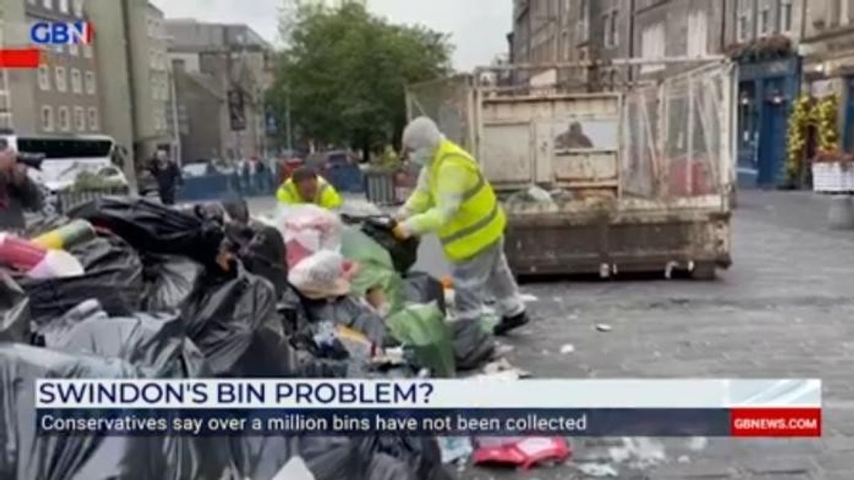 Parking row leaves street 'swimming in rubbish' after month of no bin collections