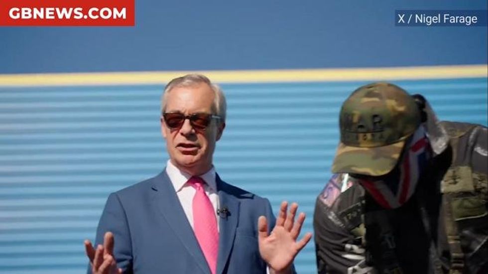 WATCH: Nigel Farage and Derek Chisora ride a tank across Tower Bridge