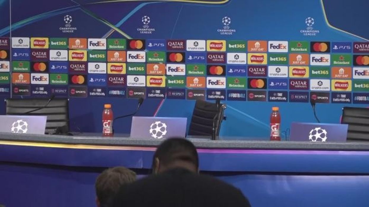 Pep Guardiola reacts to Kevin De Bruyne's early substitution after Man City beat Napoli in Champions League