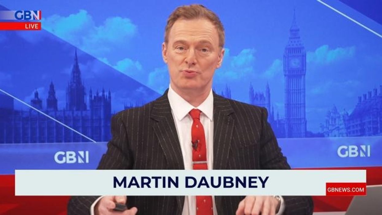 Palestine activist with Hitler placards in car RELEASED by police after just 10 minutes ... before he then REJOINED protest