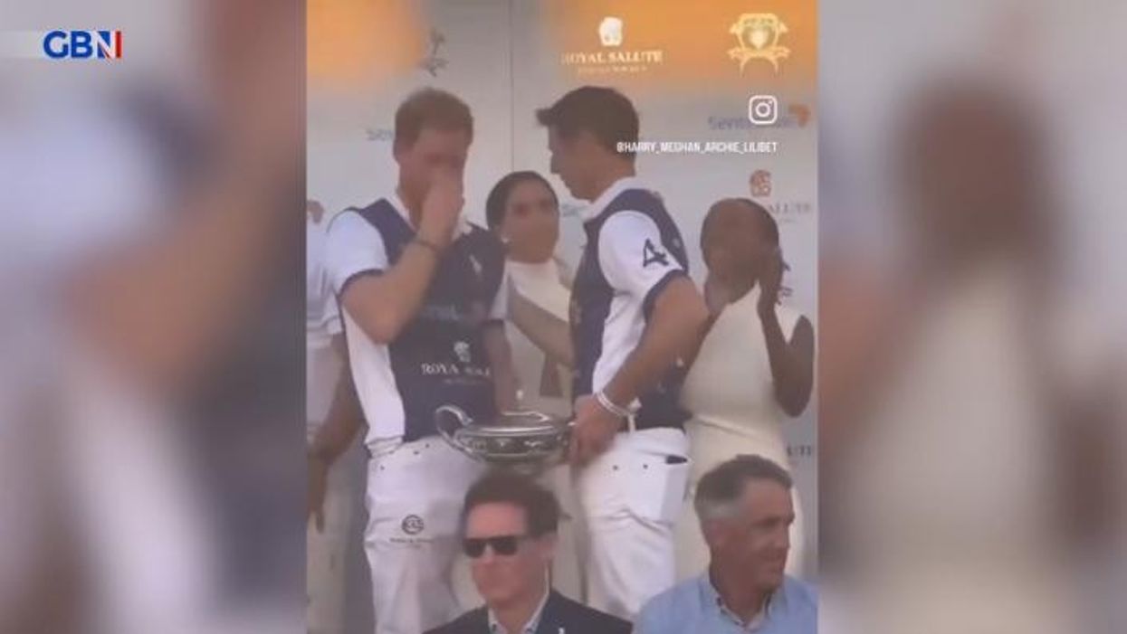Prince Harry appears to wipe nose on his shirt in front of Meghan Markle in cringeworthy video