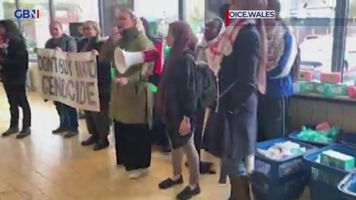 Barclays Bank in London targeted by Palestine activists as glass front shattered