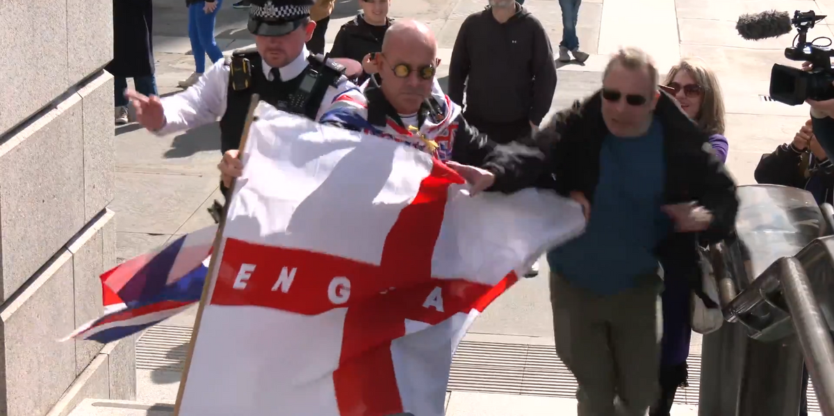 NextImg:Protestor attempts to steal St George's flag at Trafalgar Square demonstration