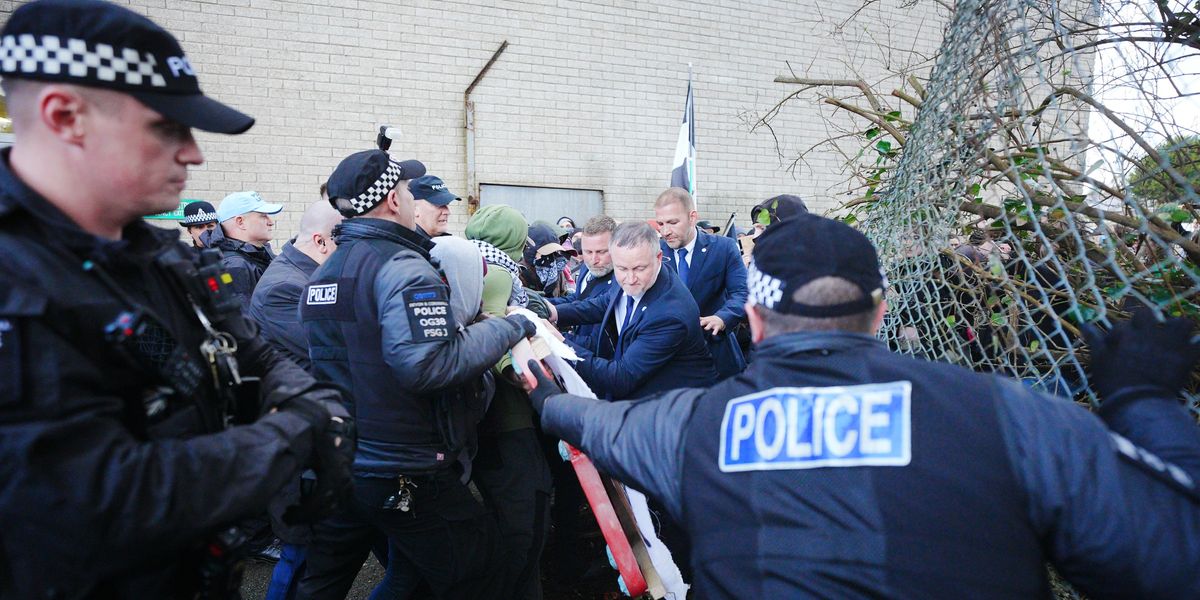 NextImg:Reform rally struck by 'violent' masked protesters as tensions flare after 'incitement' from MP