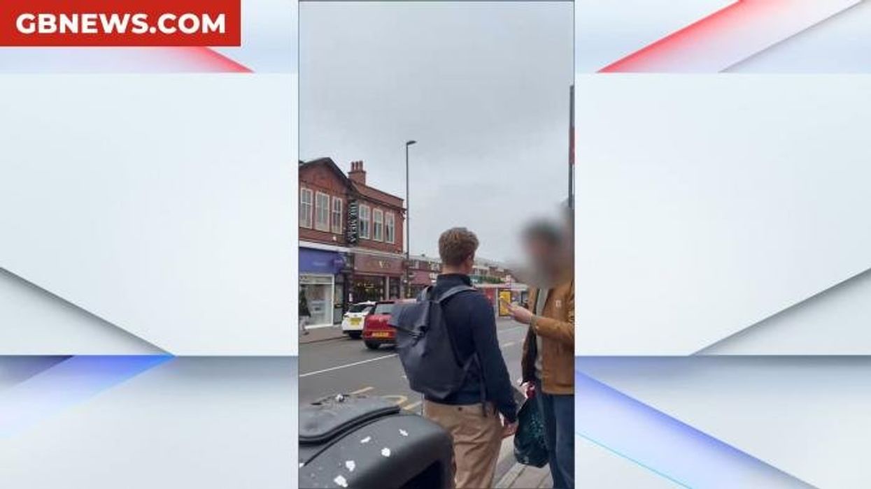‘You’re a Nazi!’ Watch the shocking moment aggressive anti-Union Jack activist ‘threatens’ Conservative