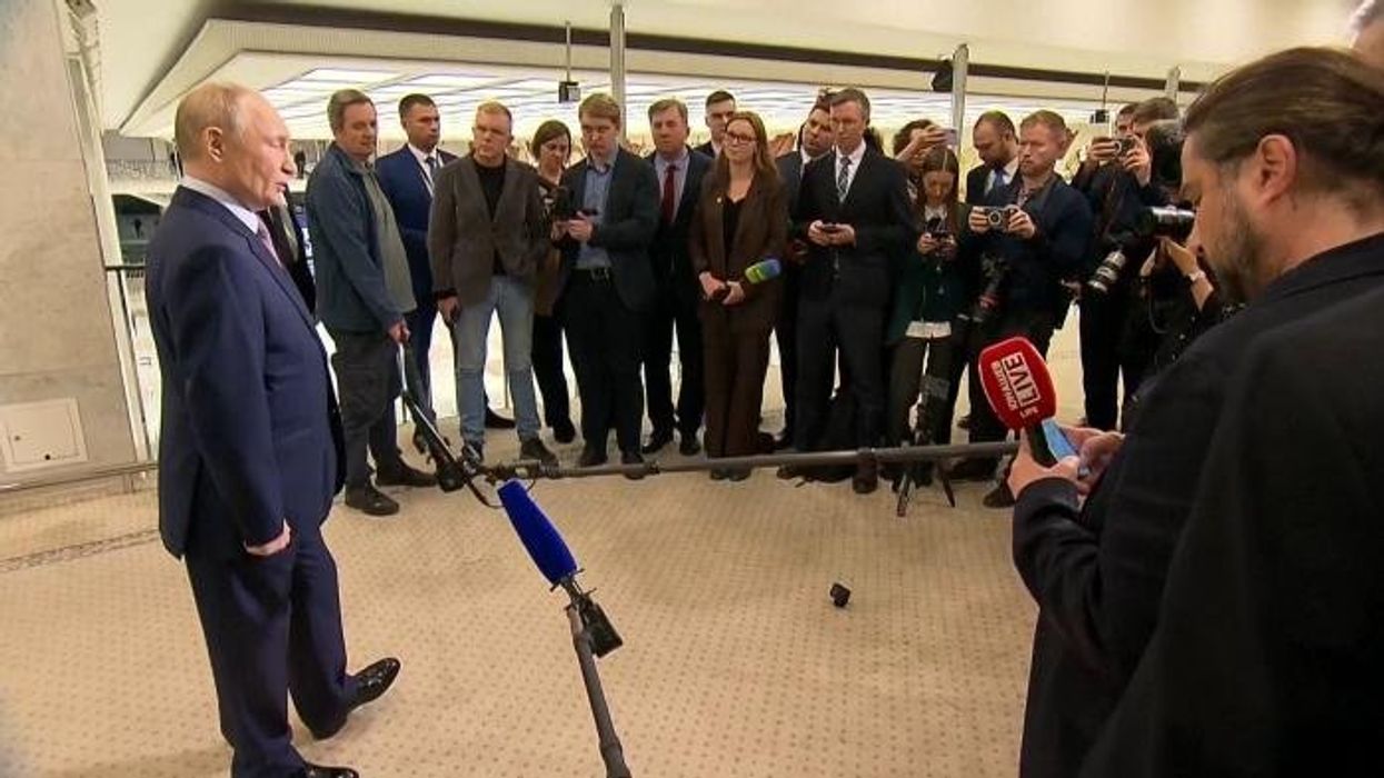 Watch moment Vladimir Putin mysteriously sways as he takes aim at 'unfriendly' US