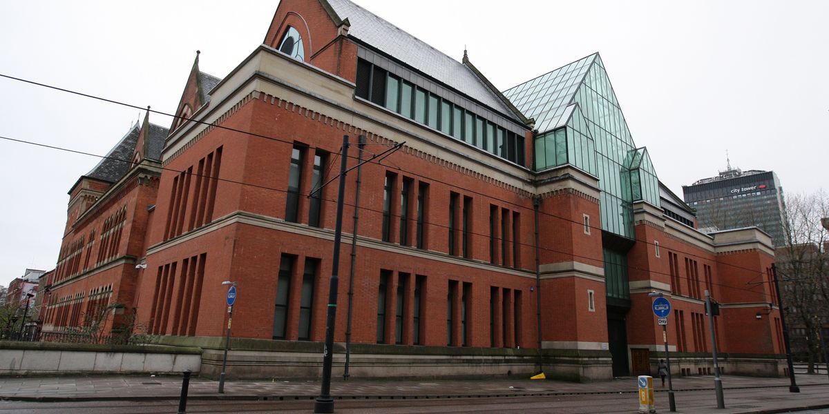 NextImg:Woman jailed after shoving flaming cardboard under neighbour's door in 'racial incident'