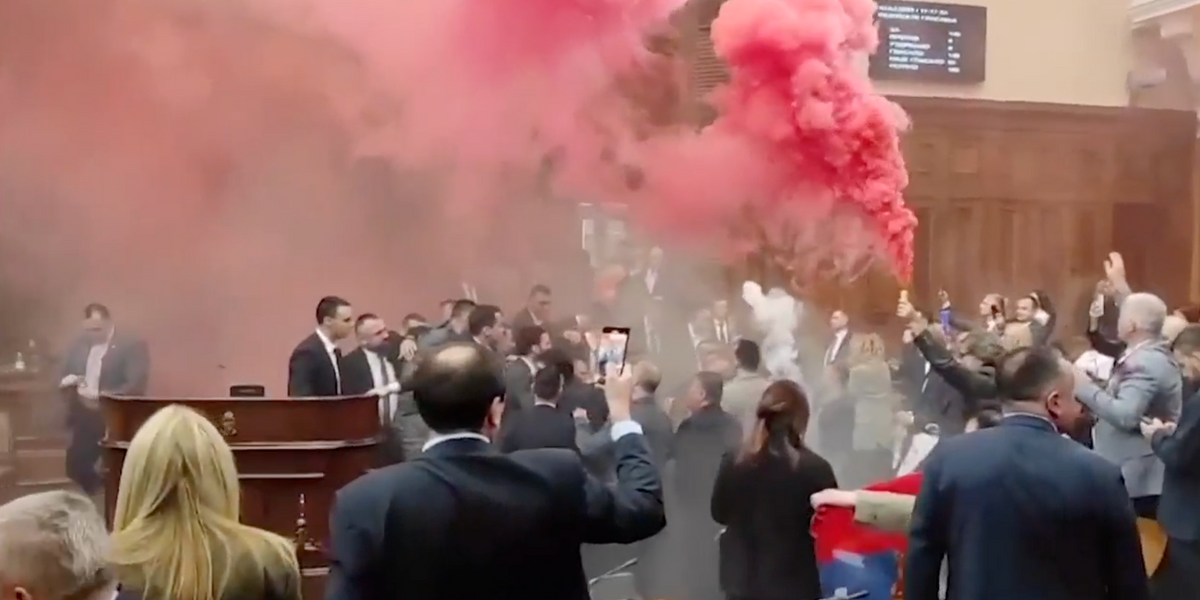 NextImg:Serbian MP suffers stroke after smoke grenades cause chaos inside parliament