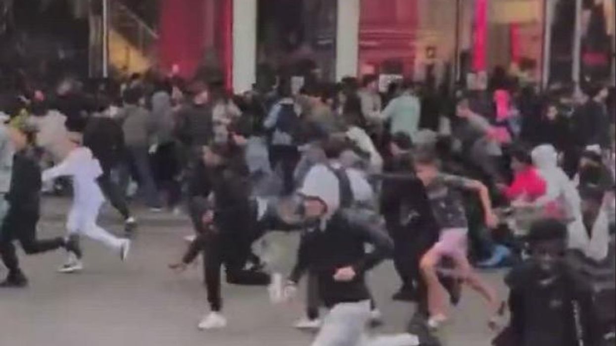 Riot police forced to deal with fried chicken giveaway chaos after 3,000 people turn up