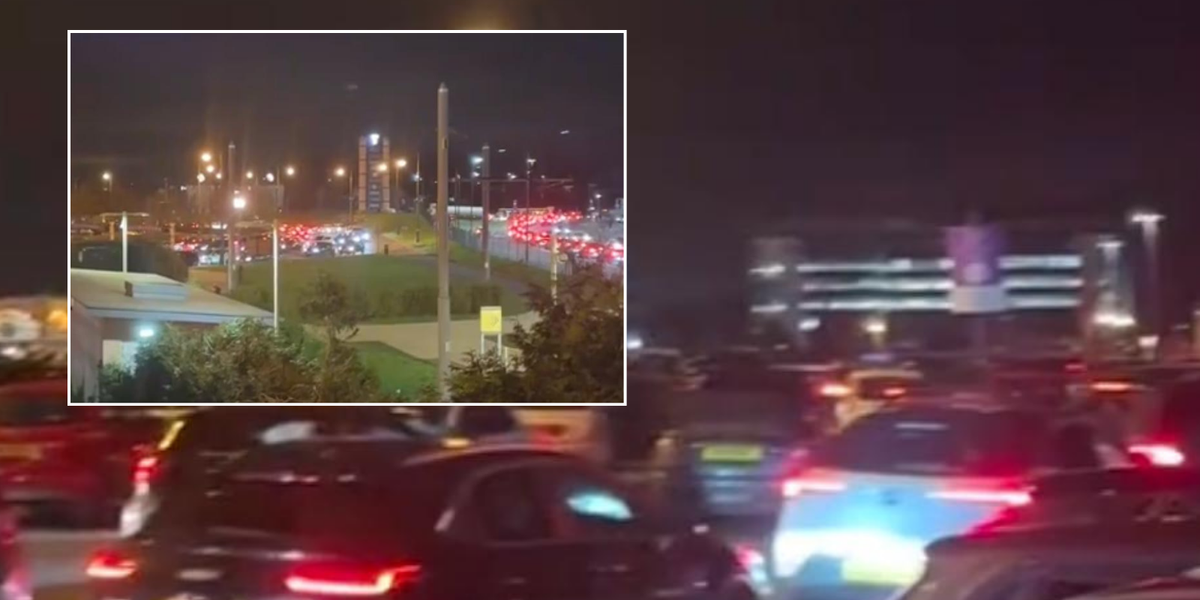 NextImg:Chaos erupts as motorists stuck in shopping centre car park for FIVE HOURS descend into violence