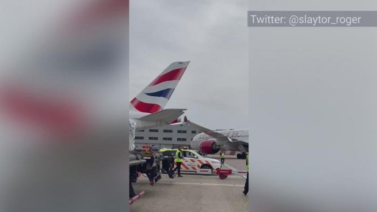 Tui cabin crew member rushed to hospital after 'falling from plane' as air ambulance called to airport