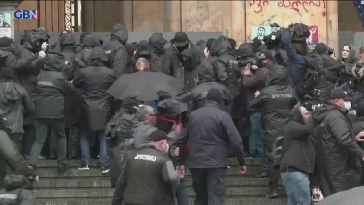 Georgia hit by violent protests as activists clash with police in fury over new 'Kremlin-like' law