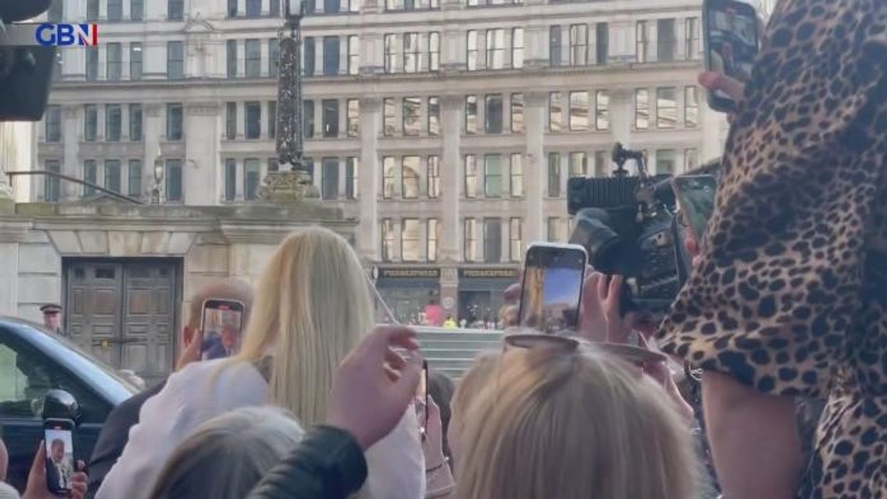 Prince Harry makes wedding joke during surprise walkabout