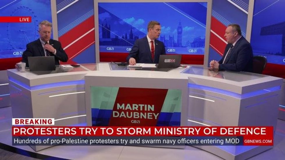 WATCH NOW: Protestors storm Ministry of Defence and swarm Royal Navy officers as police overwhelmed
