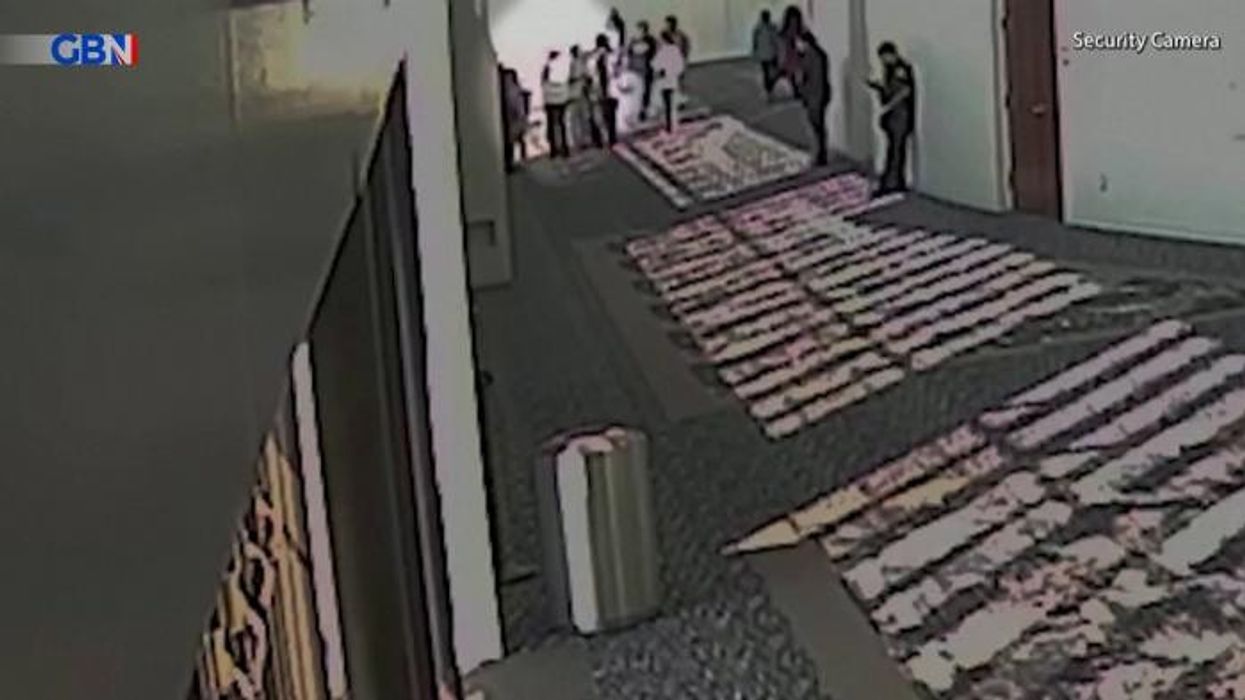 Armed woman started shooting at church with seven-year-old son by her side