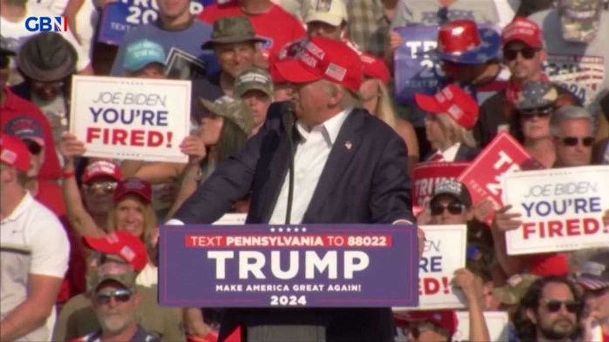 Assassin leaves chilling message on bullets used to kill UnitedHealthcare CEO in New York as manhunt continues for masked gunman