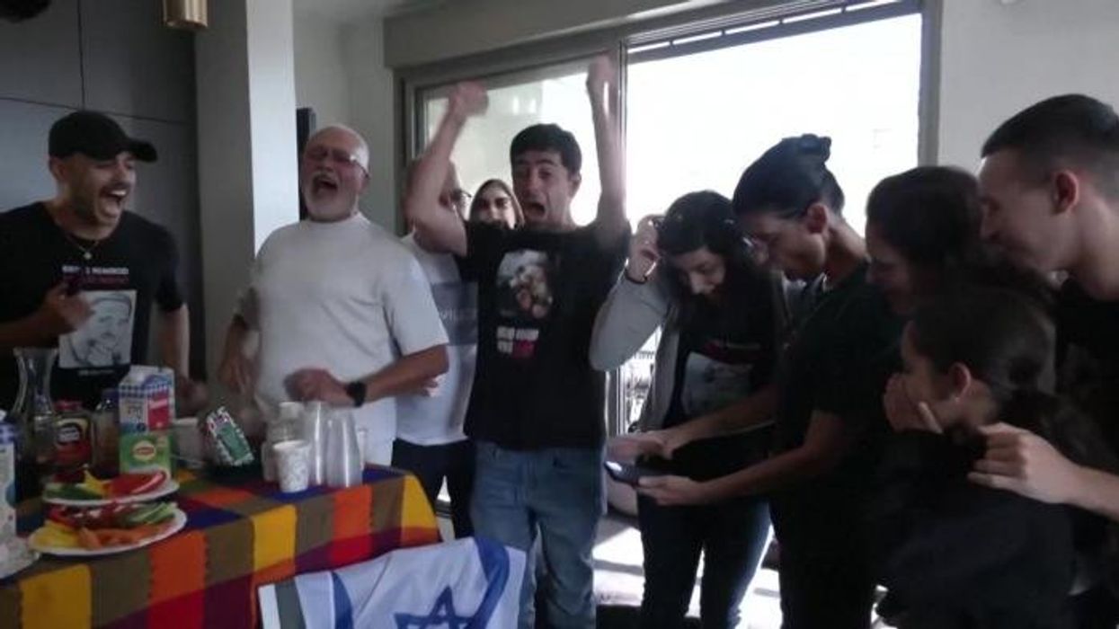 Watch the emotional moment that loved ones react to hostages being released 