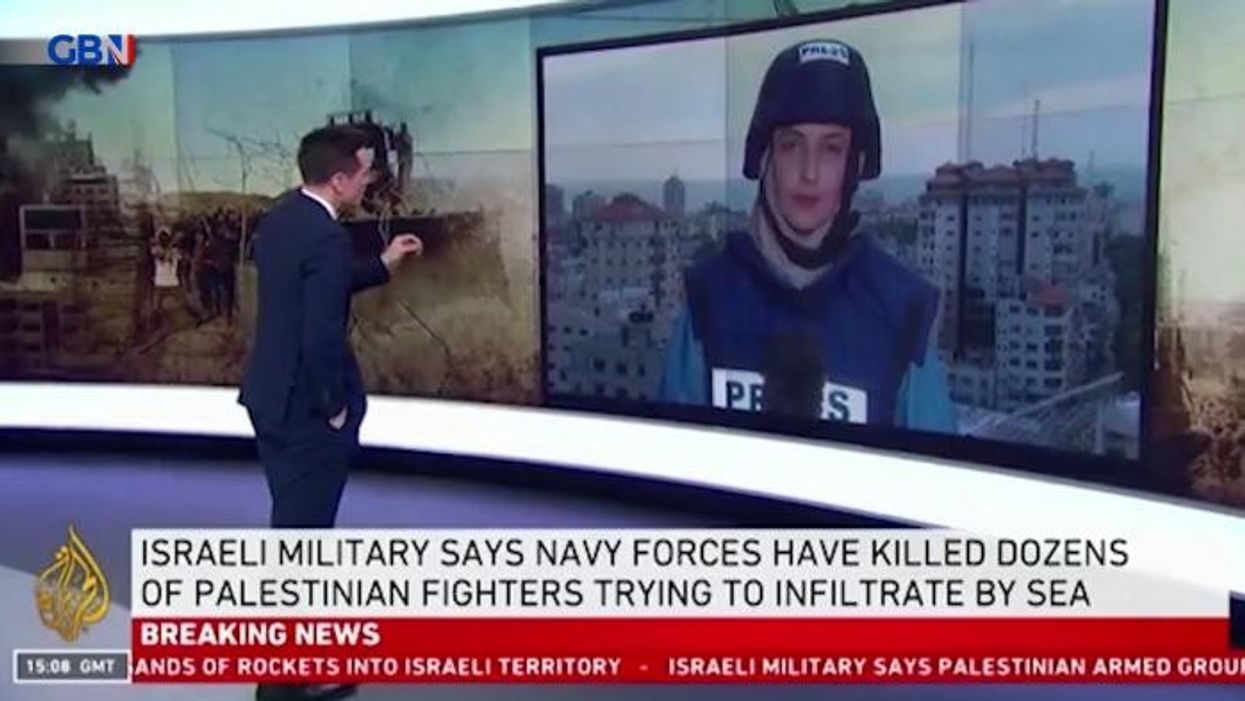 Israel: Moment reporter forced to take cover from missile strike on Palestinian tower captured on live TV