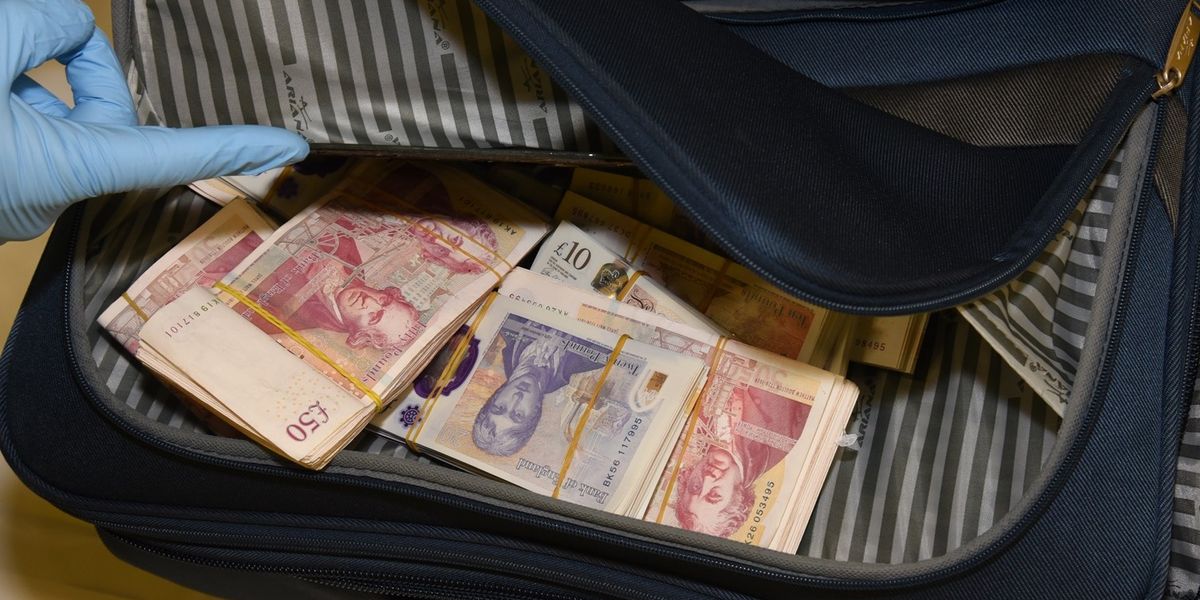 NextImg:Watch the moment officers arrest Iranian national accused of laundering £1.6m for people smugglers