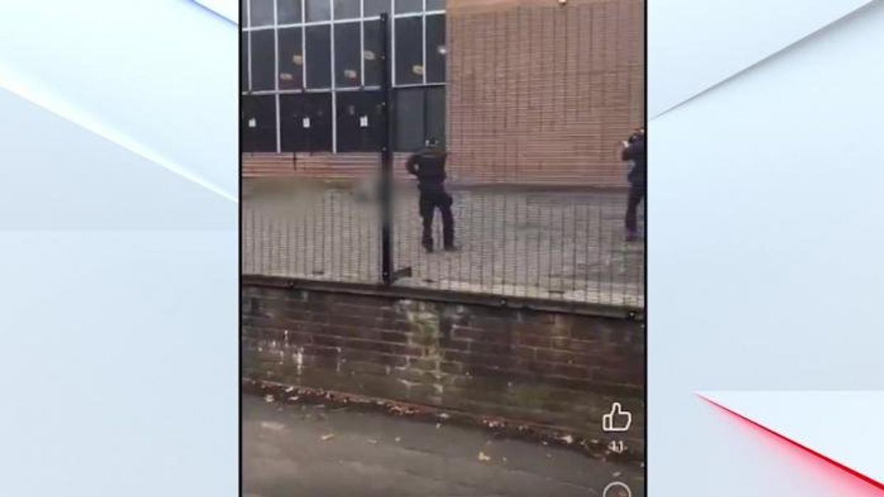 Watch the moment police confront Manchester synagogue attacker: 'Get back, he has a bomb!'