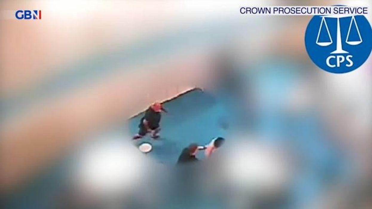 Horrifying moment prison guard left 'motionless' after being attacked by inmates in 'harrowing' footage