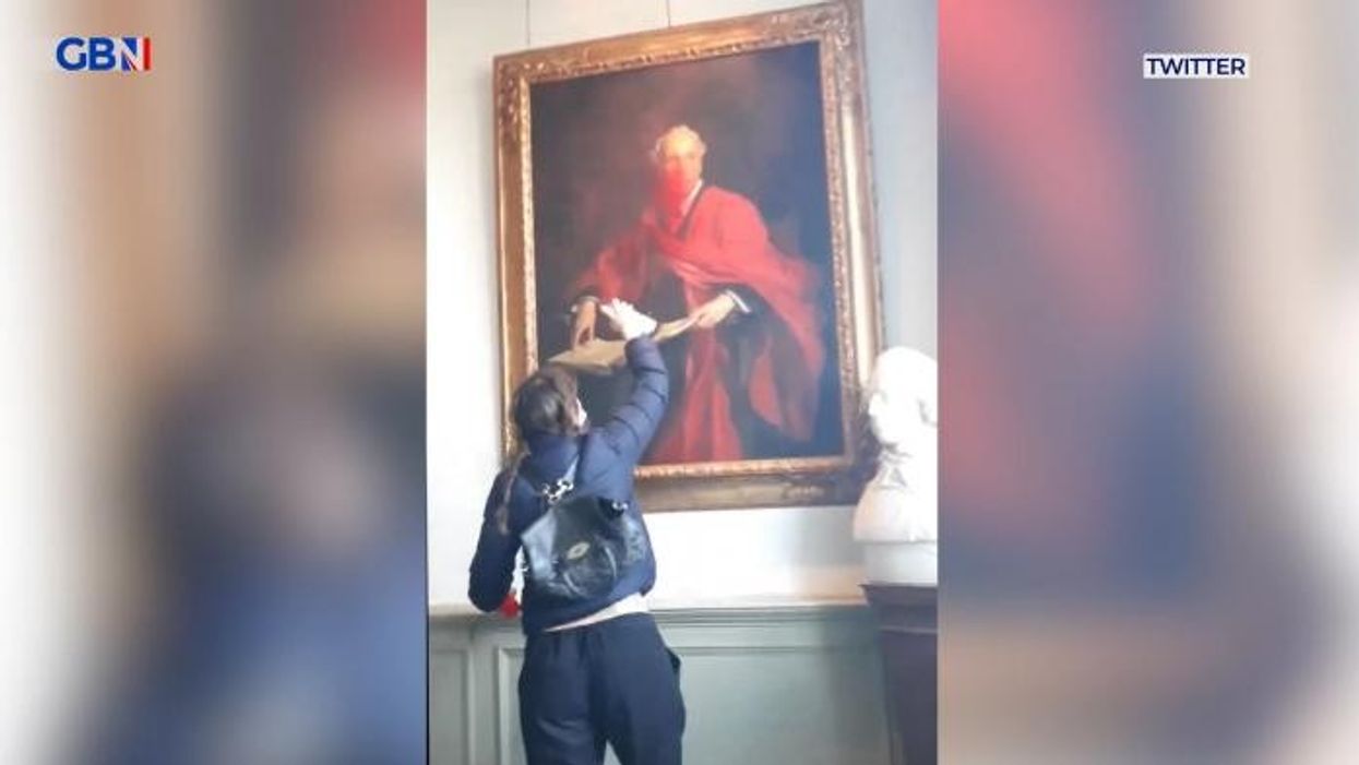 Pro-Palestinian activists hack apart and spray paint on historic Cambridge University painting
