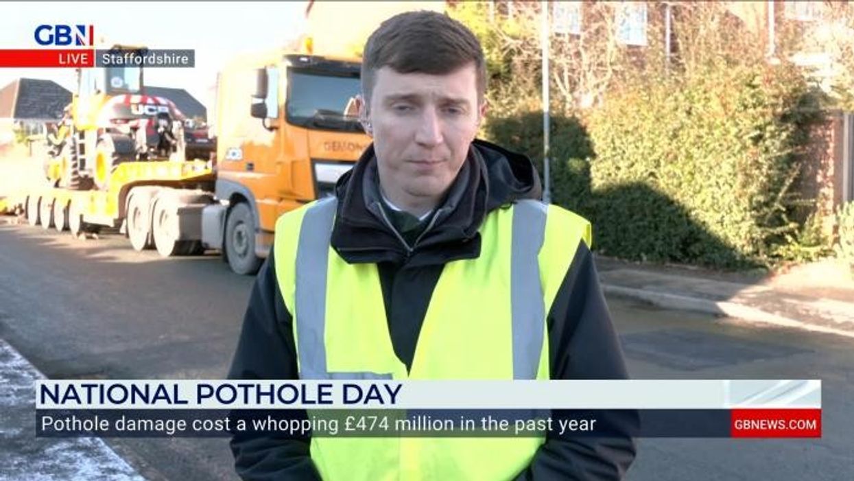 Mystery sign writer mocks council for devastating potholes and vows not to stop until he gets an apology