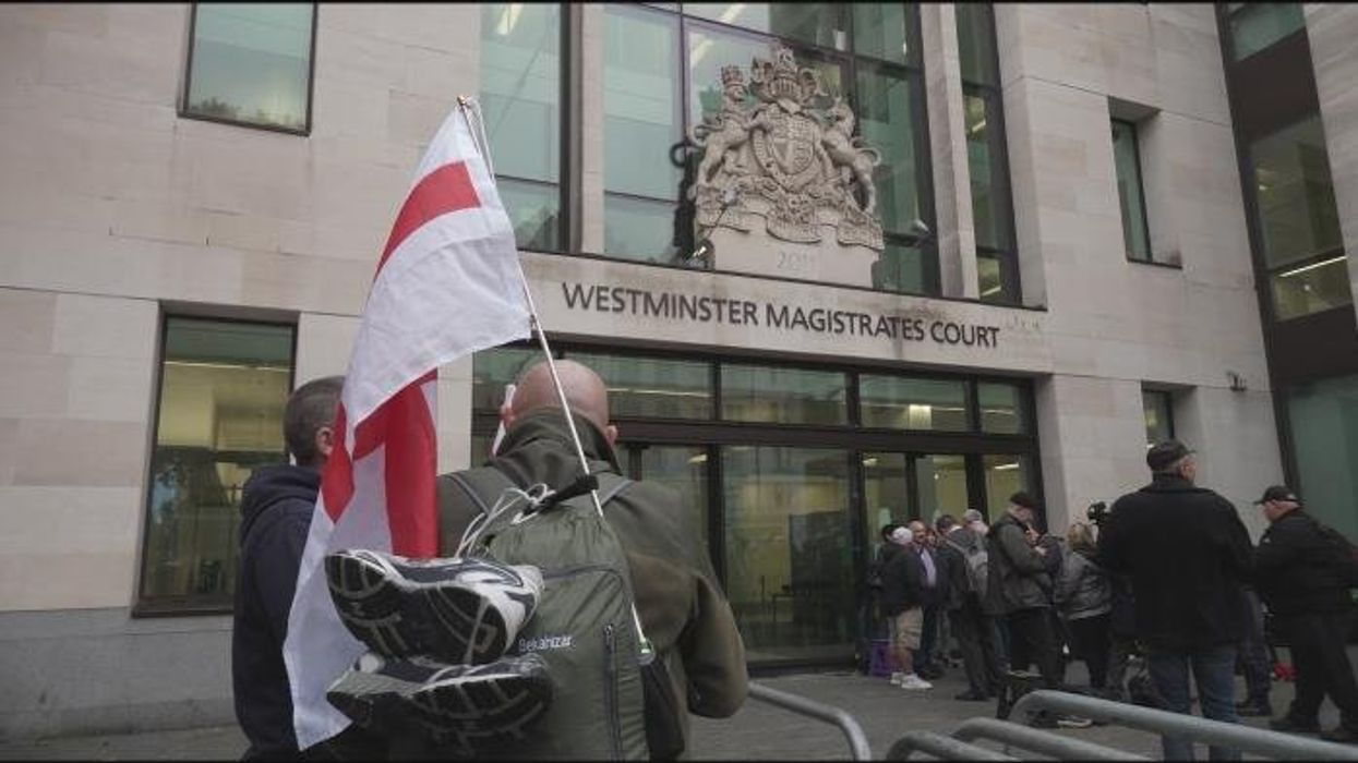 Tommy Robinson cleared of terror charge after failing to provide police with mobile phone pin