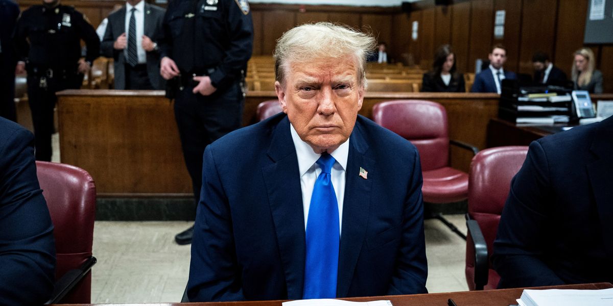 NextImg:Donald Trump takes PHONE CALL from inside court as trial begins