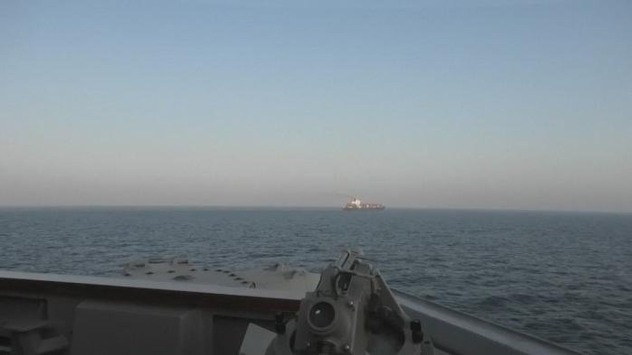 'It didn't go well for them!' US forces blow a hole in hulking Iranian ship - then seize it