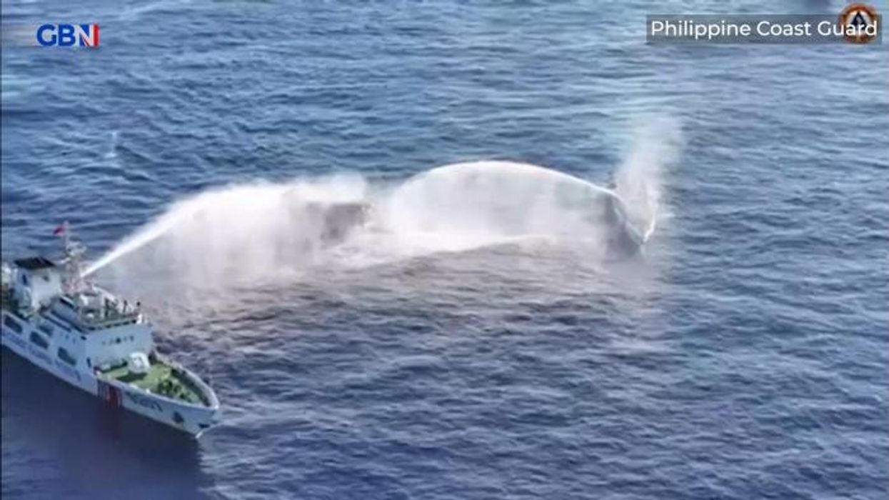 South China Sea: Beijing's boats fire water at a Philippine boat in 'dangerous manoeuvre'