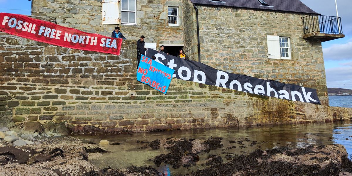 NextImg:'Clean gas is a dirty lie!' Eco-activists across Europe build blockades at oil facilities in co-ordinated action