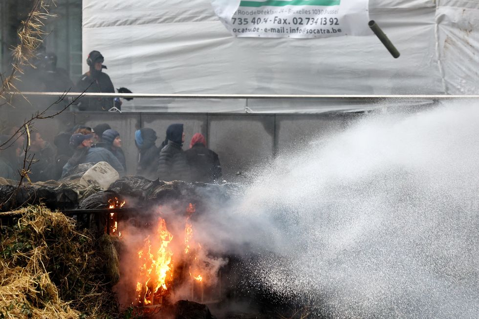 Water cannon sprays fire at Brussels protest