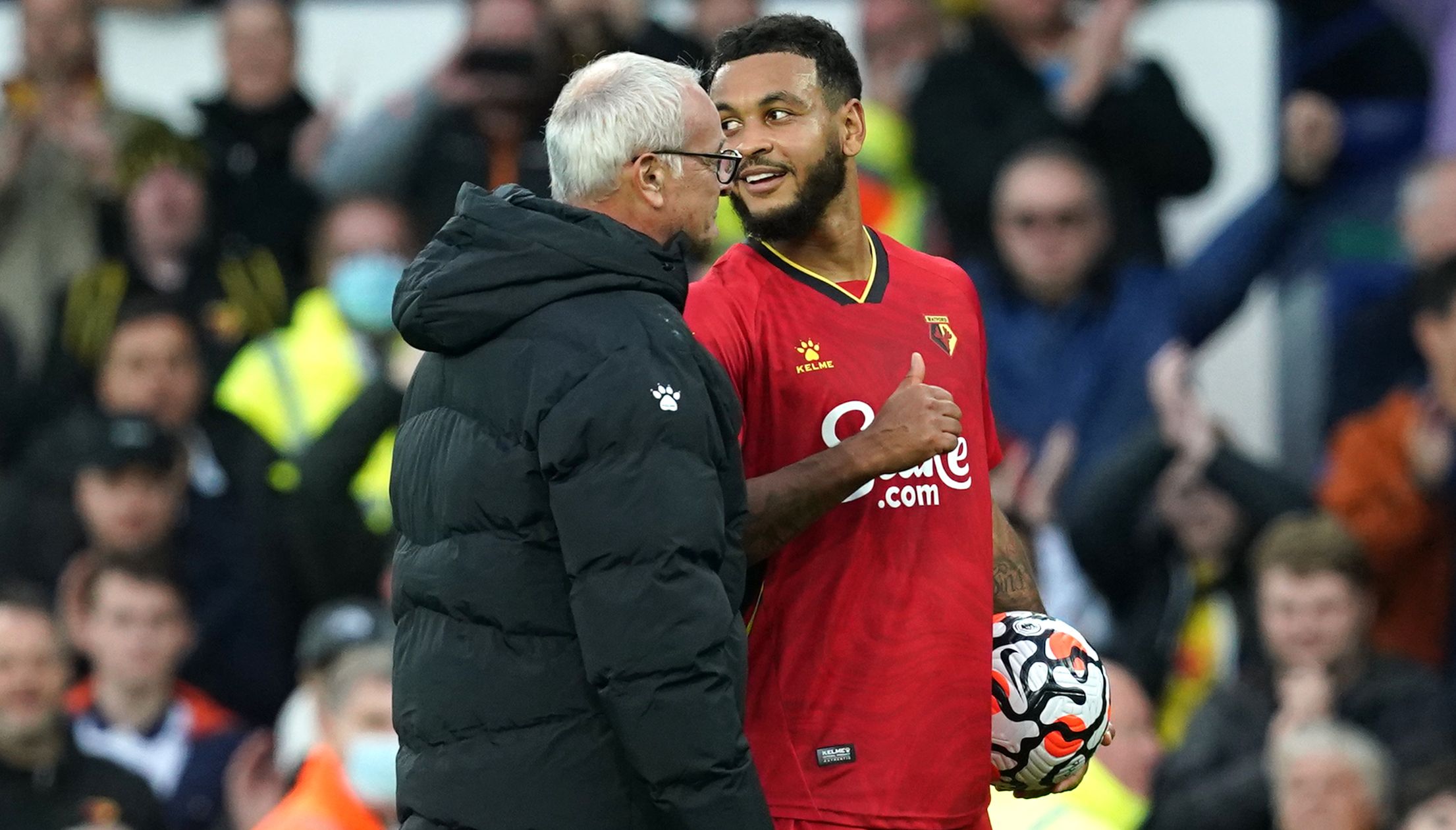 Watford manager Claudio Ranieri and hat-trick scorer Joshua King celebrate with the match ball after the final whistle during the Premier League match at Goodison Park, Liverpool.