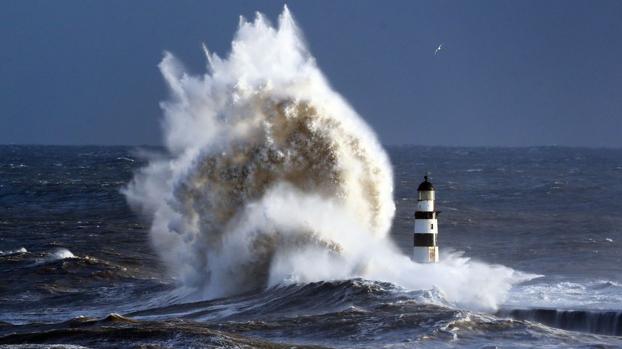 Waves crash into the sea wall at Seaham Harbour, County Durham in 2017