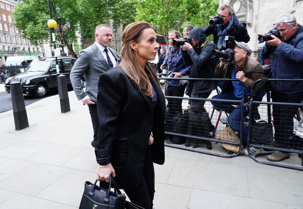 Wayne and Coleen Rooney arrive at the Royal Courts Of Justice, London, as the high-profile libel battle between Rebekah Vardy and Coleen Rooney is finally set to go to trial. Picture date: Tuesday May 10, 2022.