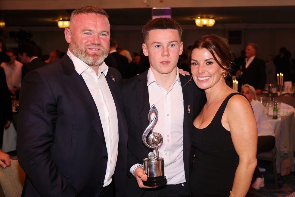 Wayne, Kai and Coleen Rooney