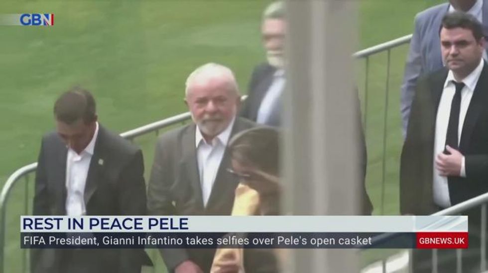 FIFA President slammed for 'classless' selfie next to Pele's open casket - 'This guy is a clown!