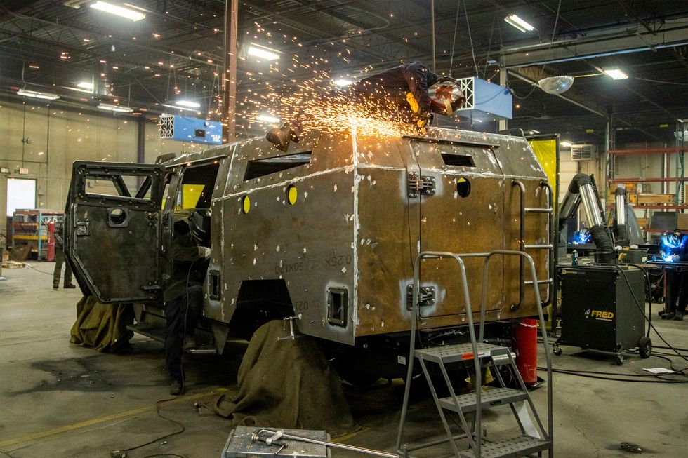 Welders work on the Senator APC at vehicle manufacturer Roshel after Canada's defence minister announced the supply of 200 Senator armoured personnel carriers to Ukraine, as part of a new package of military assistance, in Mississauga, Ontario, Canada January 19, 2023.  REUTERS/Carlos Osorio