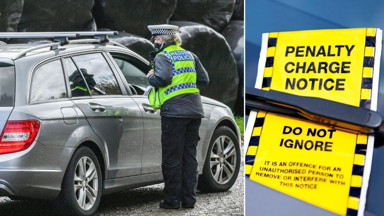Welsh police officer speaking to a driver and a penalty charge notice