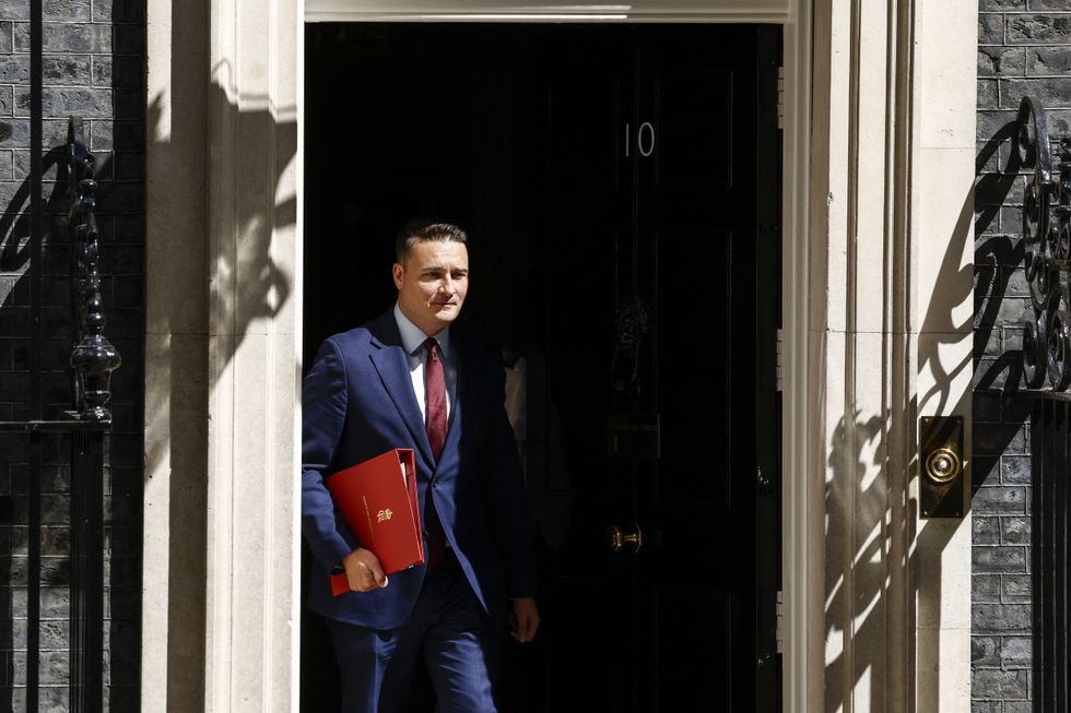 Wes Streeting exiting Downing St