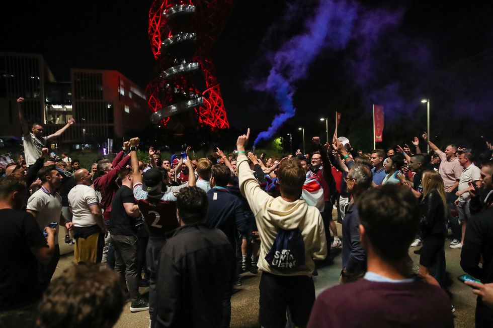 West Ham United fans celebrate outside the London Stadium following their sides victory over Fiorentina in the UEFA Europa Conference League Final