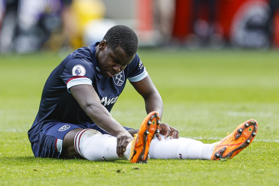 West Ham United's Kurt Zouma goes down with an injury during the Premier League match at the Brentford Community Stadium, London. Picture date: Sunday April 10, 2022.