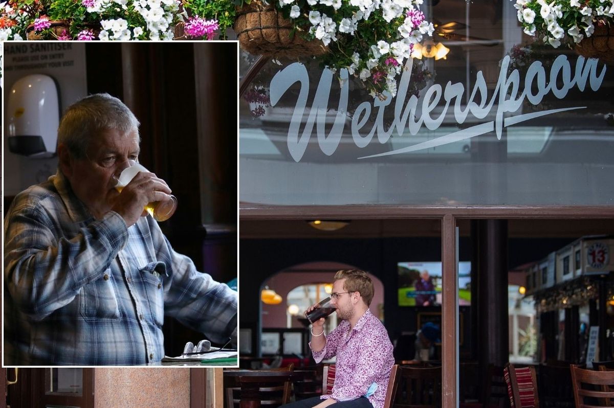 Wetherspoon and man having a pint