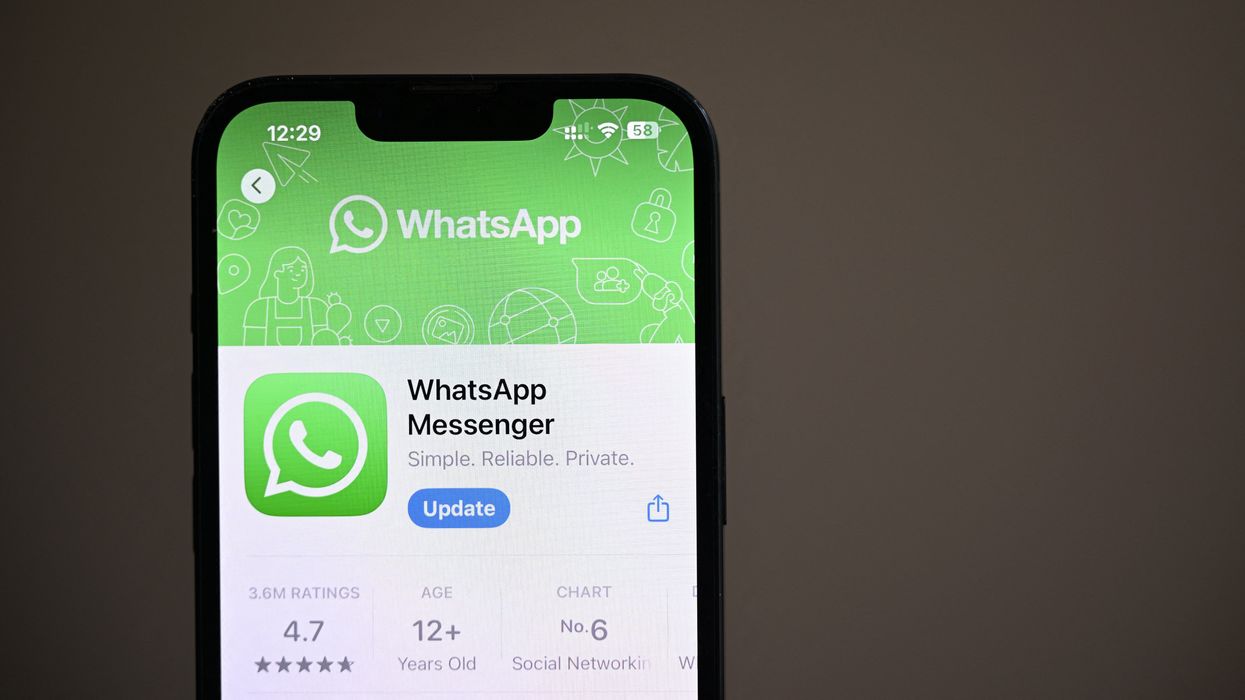 whatsapp listing in the apple app store with an update button